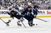 FRED GREENSLADE / THE CANADIAN PRESS
                                St. Louis Blues’ Radek Faksa (12) checks Winnipeg Jets’ Morgan Barron (36) during second period NHL playoff action in Winnipeg, Monday April 21, 2025.