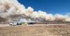 PEGUIS FIRST NATION
                                Smoke from wildfires is seen as an emergency truck passes other vehicles in an image taken from a video posted on Facebook by Peguis First Nation on Sunday.
