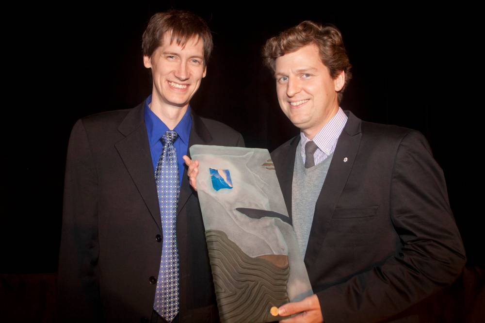 John Johnston/ Free Press Files
Stobbe (left) presents Brandon violinist James Ehnes with the Golden Baton award in 2011.