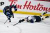 Fred Greenslade / THE CANADIAN PRESS
                                Winnipeg Jets’ Neal Pionk (left) played a career-high 46 minutes and 15 seconds Sunday night at Canada Life Centre, just eight seconds short of the NHL’s all-time record for a Game 7.
