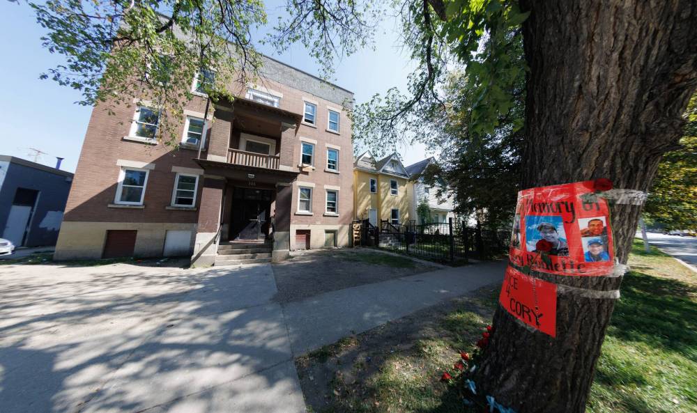 MIKE DEAL / FREE PRESS FILES
A memorial for Cory Roger Roulette is taped to the tree outside the Furby Street apartment building where he was killed in 2023. A third person pleaded guilty Tuesday in connection with the slaying.