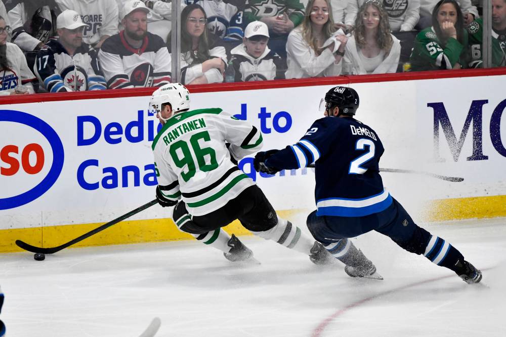 FRED GREENSLADE / THE CANADIAN PRESS
Dallas Stars’ Mikko Rantanen (96) is pursued by Winnipeg Jets’ Dylan Demelo (2) during first period NHL playoff action in Winnipeg, Friday May 9, 2025.