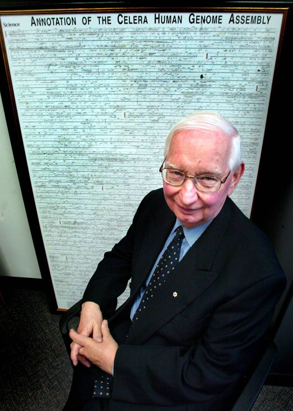 PHIL HOSSACK / FREE PRESS
Friesen poses in front of a map of the human genome.