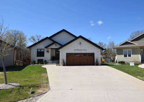 TODD LEWYS / FREE PRESS
                                The meticulously crafted, 2,200-sq.-ft. bungalow is surrounded by mature trees, making for an oasis of tranquility.