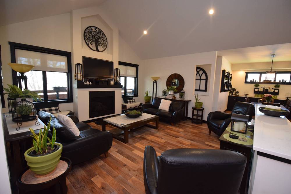 TODD LEWYS / FREE PRESS
The great room is a grand, welcoming space, perfect for entertaining or watching movies.