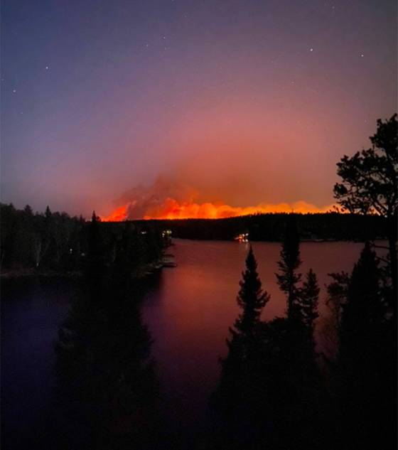 Ontario’s government said a blaze, which started in that province Monday before moving into Manitoba, measured 8,000 hectares. (Ian Farrer photo)