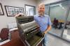 MIKE DEAL / FREE PRESS
                                Christian Klopick was shocked to have the vintage cash register, which was a fixture at Tenderloin Meat and Sausage, returned. It was stolen in February.