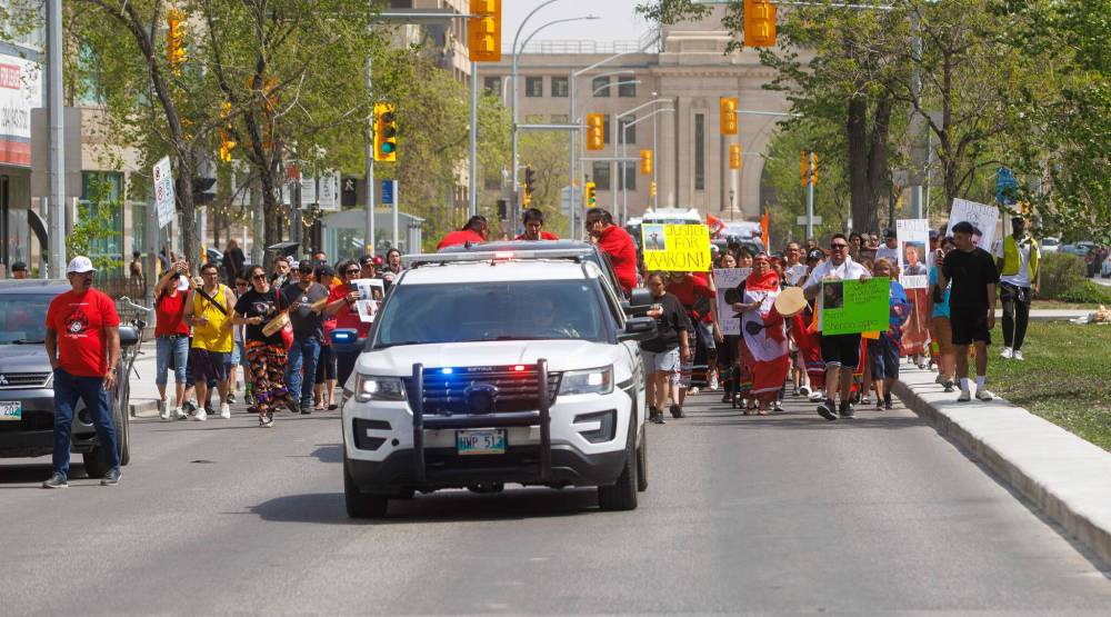 MIKE DEAL / FREE PRESS
More than 100 people joined Tuesday’s march through downtown Winnipeg.