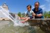 MIKE DEAL / FREE PRESS
                                Ansh Poddar, 2, and his father, Chandan, take a moment to cool off at the fountain near the Manitoba Legislative Building, Monday. Winnipeg was Canada’s hotspot Tuesday afternoon, shattering local records amid an ongoing heat wave that isn’t expected to break until later this week.