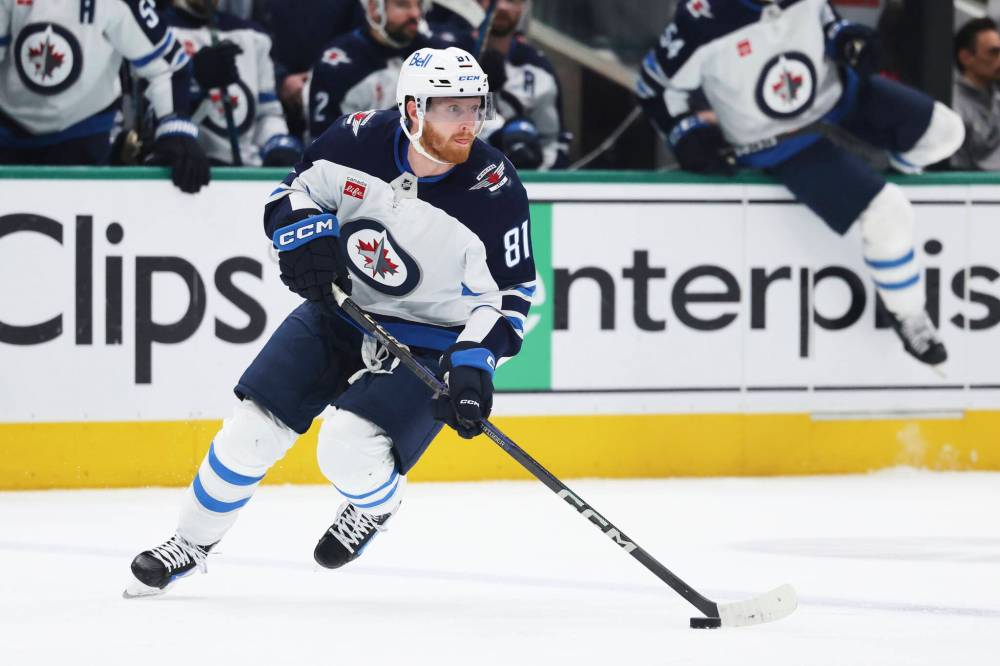 Gareth Patterson / The Associated Press
Winnipeg Jets left wing Kyle Connor controls the puck in the second period.