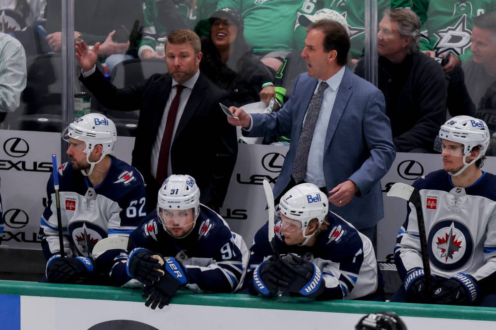 Gareth Patterson / The Associated Press
Winnipeg Jets head coach Scott Arniel, back right, yells at his players on the ice in the third period of Game 4 of their second-round NHL hockey playoff series in Dallas, Tuesday.