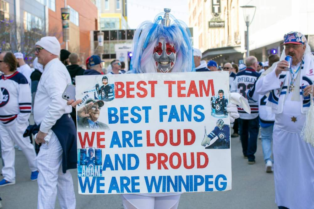 Jets fan Sheila Hathaway shows hockey spirit during Game 1 between the Winnipeg Jets and the St. Louis Blue as she attends the Winnipeg Jets Whiteout party in April. (Brook Jones / Free Press files)