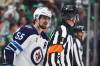 GARETH PATTERSON / ASSOCIATED PRESS
                                Winnipeg Jets’ Mark Scheifele (55) talks to referee Dan O’Rourke (9) after Scheifele was issed a tripping penalty in the third period of Game 6 of a second-round NHL hockey playoff series against the Dallas Stars in Dallas, Saturday, May 17, 2025.