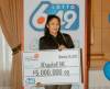 SUPPLIED
                                Krystal McKay claiming the $5 million Lotto 6/49 prize, January 20, 2024.