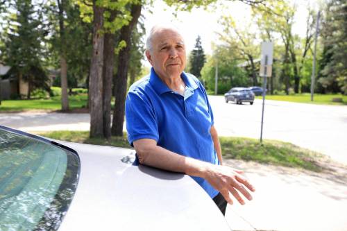 RUTH BONNEVILLE / FREE PRESS
                                Terry Bailey doesn&rsquo;t own a smartphone and regularly uses cash or a credit card to park at the pay stations dotted around downtown.