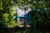 MIKAELA MACKENZIE / FREE PRESS 	 Tents by the river on Waterfront Drive on Thursday, May 22, 2025. For Erik story. Winnipeg Free Press 2025