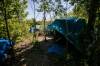 MIKAELA MACKENZIE / FREE PRESS
                                Tents by the river on Waterfront Drive on Thursday, May 22, 2025. For Erik story. Winnipeg Free Press 2025