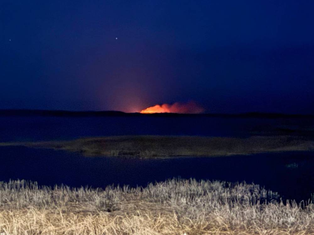 Pimicikamak Cree Nation evacuated about 300 vulnerable residents over the weekend as a handful of out-of-control wildfires burned in the region, the largest of which was located just five kilometres west of the First Nation. (Submitted)