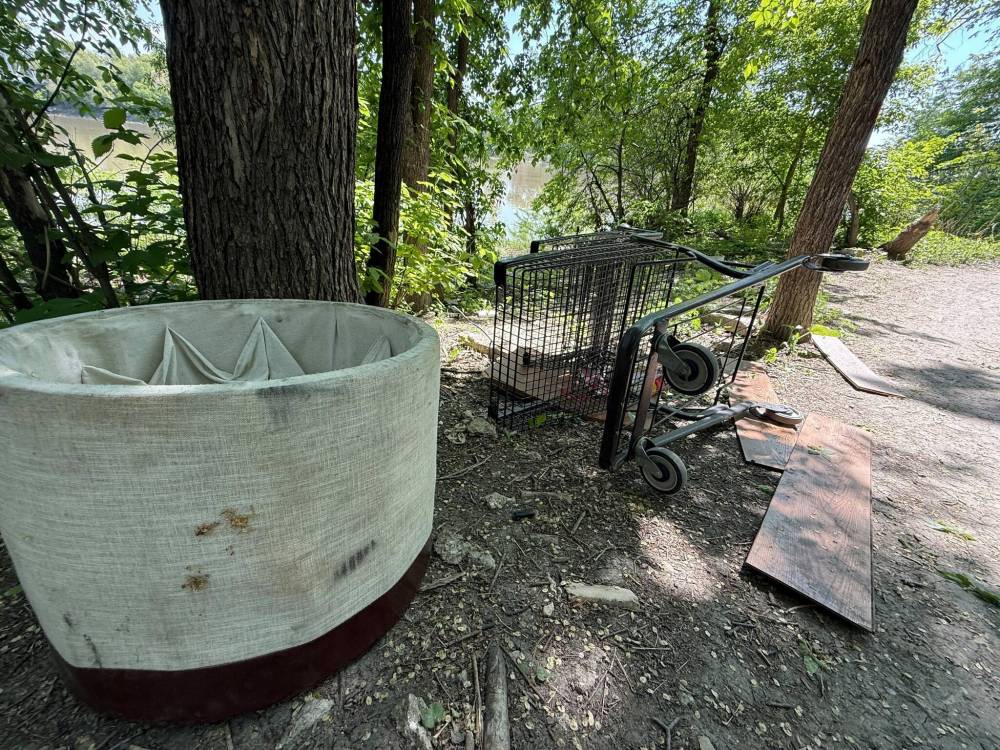 SCOTT BILLECK / FREE PRESS
Some former homeless encampment spots are reduced to flattened brush and discarded garbage.