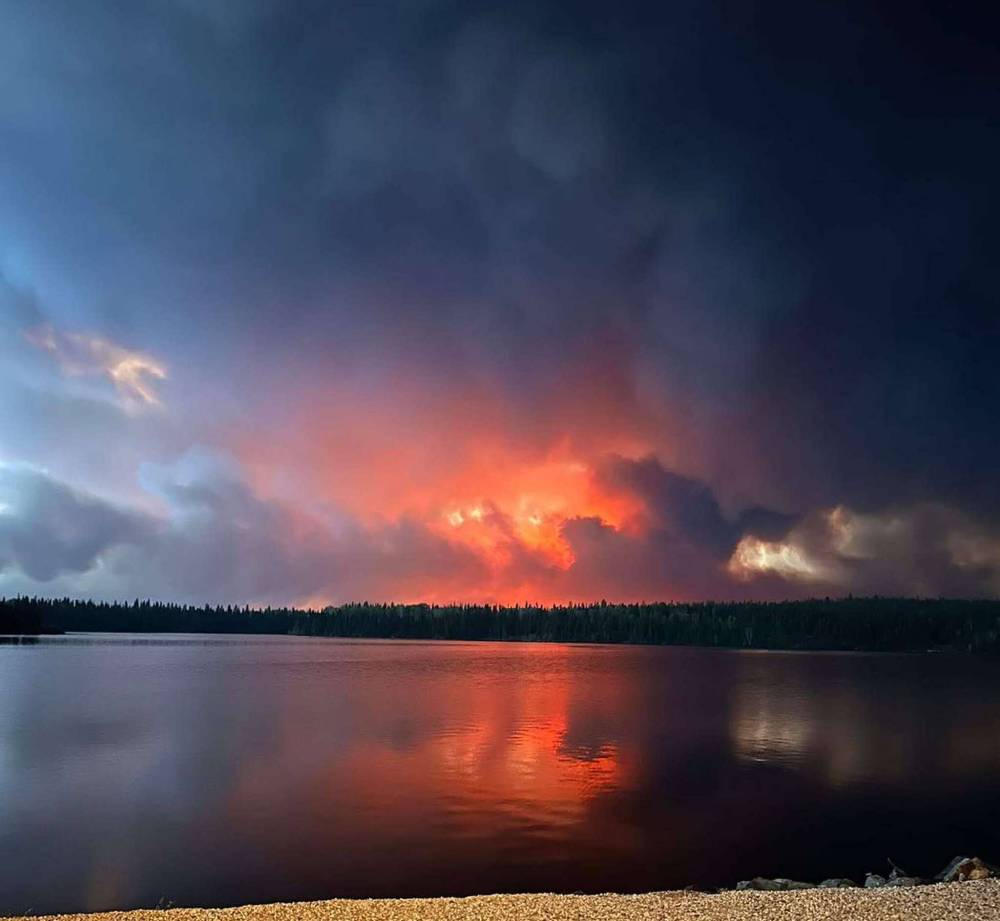 SUPPLIED
                                Wildfire west of the northern community of Sherridon, Monday.