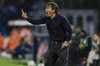Napoli head coach Antonio Conte shouts on the sideline during a Serie A soccer match against Genoa at the Diego Armando Maradona Stadium in Naples, southern Italy, Sunday, May 11, 2025. (Alessandro Garofalo/LaPresse via AP)