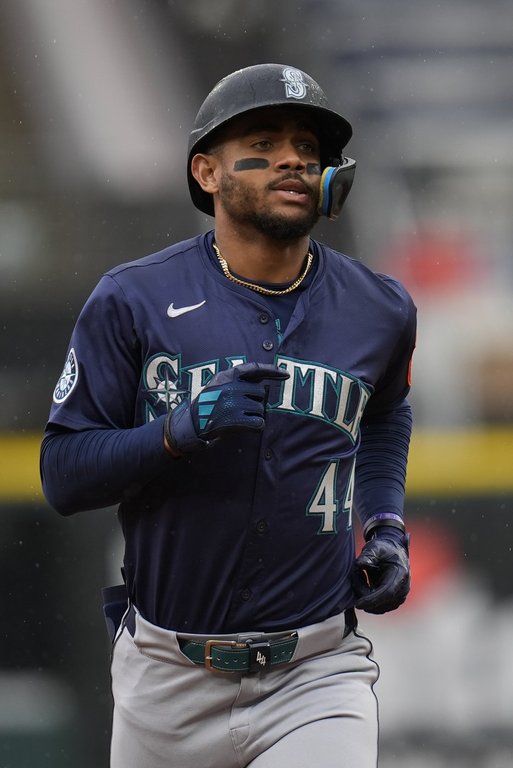 Seattle Mariners' Julio Rodríguez (44) runs the bases after hitting a three-run home run during the first inning of a baseball game against the Chicago White Sox, Wednesday, May 21, 2025, in Chicago. (AP Photo/Erin Hooley)
