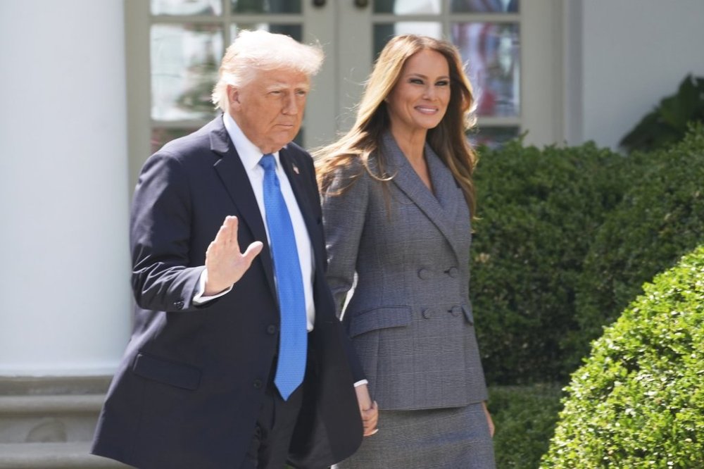 President Donald Trump and first lady Melania Trump arrive in the Rose Garden at the White House, Monday, May 19, 2025 in Washington, where President Trump will sign the