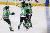 Dallas Stars' Mason Marchment (27), Cody Ceci (44) and Thomas Harley, right, celebrate Harley's goal in overtime of Game 6 of a second-round NHL hockey playoff series against the Winnipeg Jets in Dallas, Saturday, May 17, 2025. (AP Photo/Gareth Patterson)
