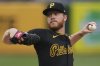 Pittsburgh Pirates pitcher Bailey Falter delivers during the first inning of a baseball game against the Cincinnati Reds in Pittsburgh, Tuesday, May 20, 2025. (AP Photo/Gene J. Puskar)