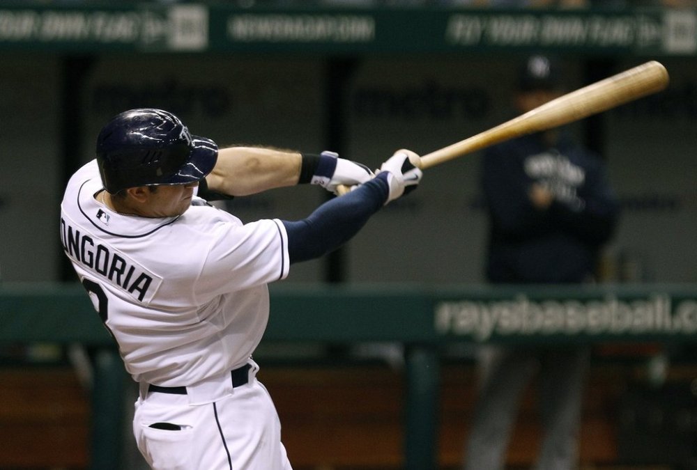 FILE - Tampa Bay Rays' Evan Longoria hits a 12th-inning home run off New York Yankees relief pitcher Scott Proctor during a baseball game early Thursday, Sept. 29, 2011, in St. Petersburg, Fla. (AP Photo/Chris O'Meara, File)