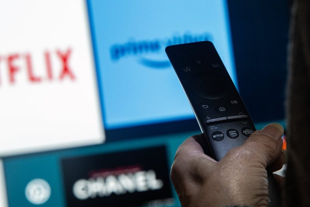 A television remote control shows buttons to access streaming services in a photo illustration made in Toronto, Friday, March 22, 2024. THE CANADIAN PRESS/Giordano Ciampini