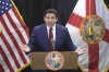 FILE - Florida Gov. Ron DeSantis delivers remarks during a news conference in Lake Buena Vista, Fla., Feb. 22, 2024. (Joe Burbank/Orlando Sentinel via AP, File)