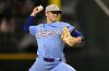 Texas Rangers starting pitcher Jack Leiter throws during the first inning against the Houston Astros in a baseball game in Arlington, Texas, Sunday, May 18, 2025. (AP Photo/Jerome Miron)