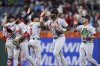 St. Louis Cardinals players celebrate after winning a baseball game against the Philadelphia Phillies Monday, May 12, 2025, in Philadelphia. (AP Photo/Matt Slocum)