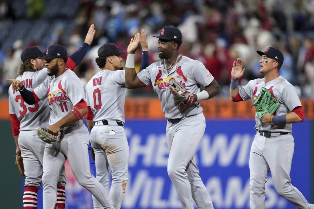 St. Louis Cardinals players celebrate after winning a baseball game against the Philadelphia Phillies Monday, May 12, 2025, in Philadelphia. (AP Photo/Matt Slocum)