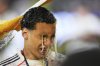 Bayern's Jamal Musiala is doused with beer after the German Bundesliga's soccer match between FC Bayern Munich and Borussia Moenchengladbach in Munich, Germany, Saturday, May 10, 2025. (AP Photo/Matthias Schrader)