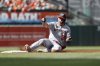 Washington Nationals' Jacob Young slides into third base after hitting a triple off Baltimore Orioles pitcher Kyle Gibson during the first inning of a baseball game in Baltimore, Saturday, May 17, 2025. (AP Photo/Terrance Williams)