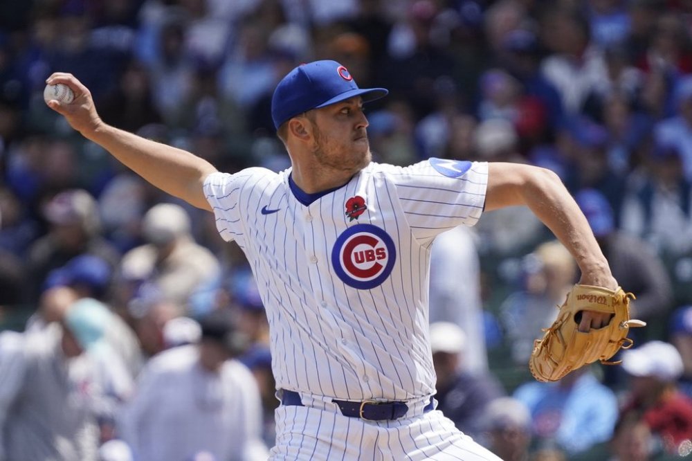 Chicago Cubs pitcher Jameson Taillon (50) throws the ball against the Colorado Rockies during the first inning of a baseball game Monday, May 26, 2025, in Chicago. (AP Photo/David Banks)