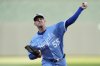 Kansas City Royals starting pitcher Cole Ragans throws during the first inning of a baseball game against the St. Louis Cardinals, Friday, May 16, 2025, in Kansas City, Mo. (AP Photo/Charlie Riedel)