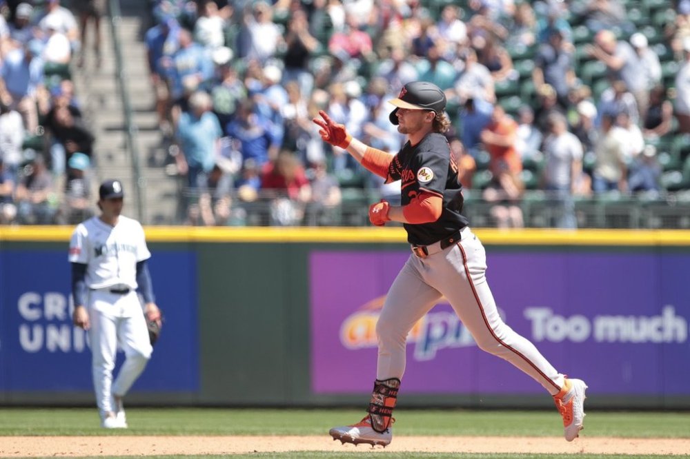 Baltimore Orioles' Gunnar Henderson jogs the bases after hitting a home run off Seattle Mariners starting pitcher Bryan Woo during the sixth inning of a baseball game, Thursday, June 5, 2025, in Seattle. (AP Photo/Jason Redmond)