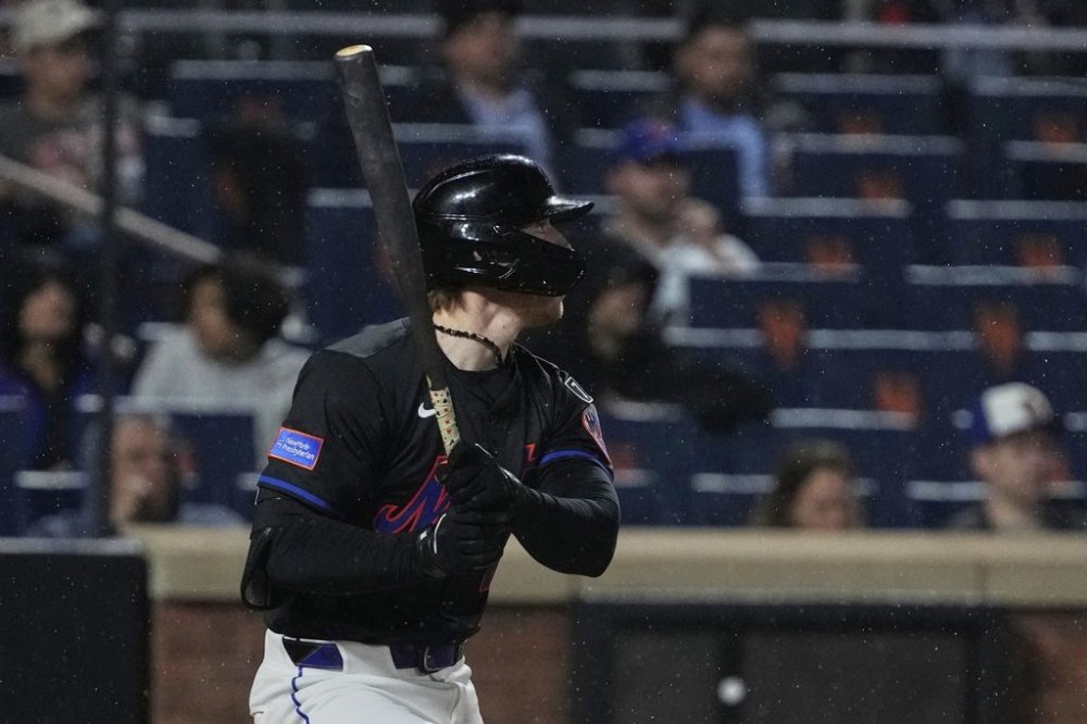 New York Mets' Brett Baty follows through on a home run during the seventh inning of a baseball game against the Pittsburgh Pirates Tuesday, May 13, 2025, in New York. (AP Photo/Frank Franklin II)