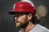 St. Louis Cardinals' Brendan Donovan returns to the dugout after scoring on a two-run single hit in by Jordan Walker during the fourth inning of a baseball game against the Baltimore Orioles, Wednesday, May 28, 2025, in Baltimore. (AP Photo/Stephanie Scarbrough)