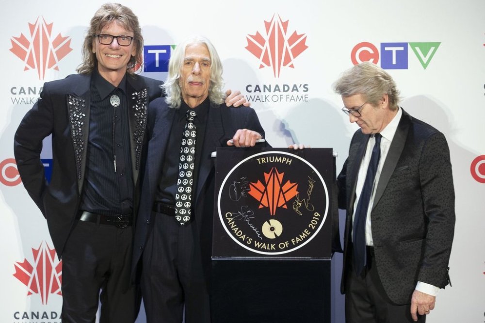 Gil Moore (left), Mike Levine (centre) and Rik Emmett of the rock band