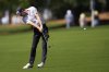 Alex Smalley hits from the fairway on the second hole during the first round of the PGA Championship golf tournament at the Quail Hollow Club, Thursday, May 15, 2025, in Charlotte, N.C. (AP Photo/George Walker IV)