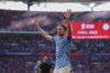 Manchester City's Kevin De Bruyne acknowledge fans after losing the FA Cup final between Manchester City and Crystal Palace at the Wembley Stadium in London, Saturday, May 17, 2025. (AP Photo/Ian Walton)