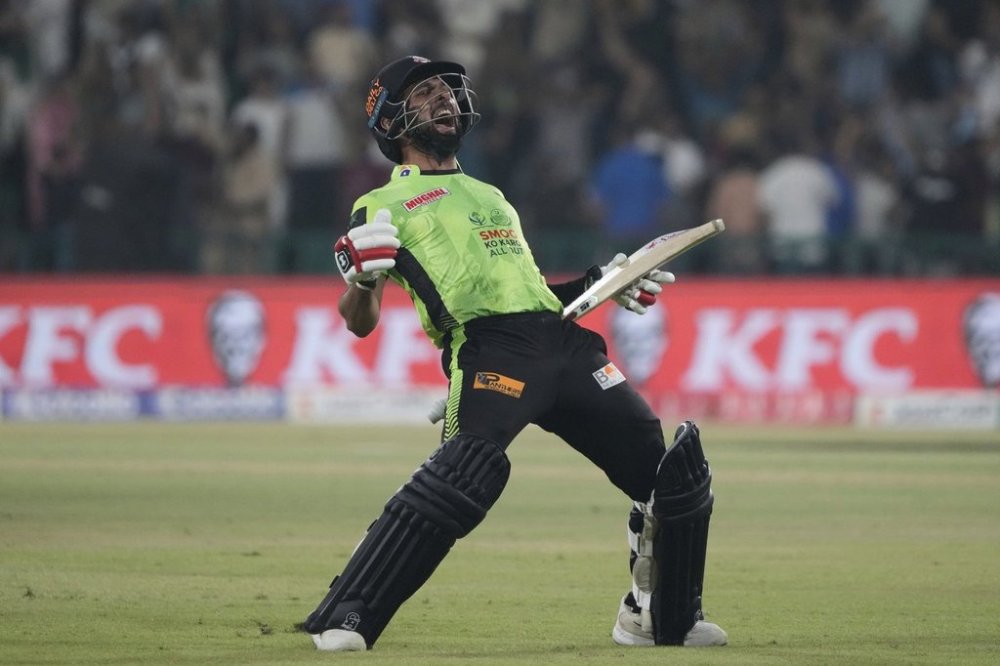 Lahore Qalandars' Sikandar Raza celebrates after winning the Pakistan Super League Twenty20 final cricket match against Quetta Gladiators, in Lahore, Pakistan, Sunday, May 25, 2025. (AP Photo/K.M. Chaudary)