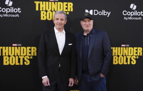 Bob Iger, left, CEO of the Walt Disney Company, and Kevin Feige, president of Marvel Studios, pose together at the premiere of the film 