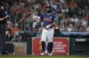 Houston Astros' Jose Altuve tosses his bat after striking out during the fifth inning of a baseball game against the Tampa Bay Rays in Houston, Sunday, June 1, 2025. (AP Photo/Ashley Landis)