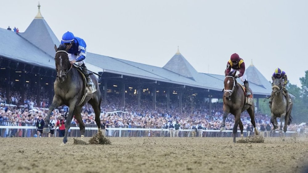 Sovereignty (2), with jockey Junior Alvarado up, crosses the finish line ahead of Journalism (7), with jockey Umberto Rispoli up, and Baeza (6), with jockey Flavien Prat up, to win the 157th running of the Belmont Stakes horse race, Saturday, June 7, 2025, in Saratoga Springs, N.Y. (AP Photo/Seth Wenig)
