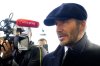 FILE - David Beckham speaks to the media after leaving Westminster Palace where he paid respects to the late Queen Elizabeth II, at Westminster Hall, London, England, Friday, Sept. 16, 2022. (AP Photo/Markus Schreiber, File)
